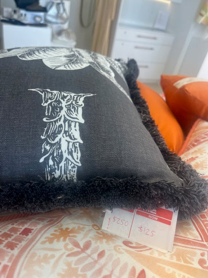 Designer cushion with fringing